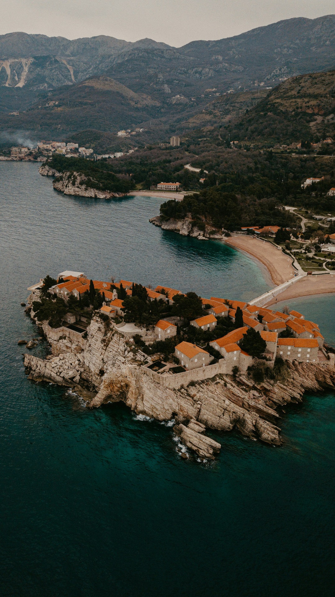 Aerial view of Sveti Stefan island and the Budva Riviera coastline